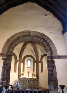 Damage to plaster on the upper walls of the church, caused by damp entering the roof and interior walls 